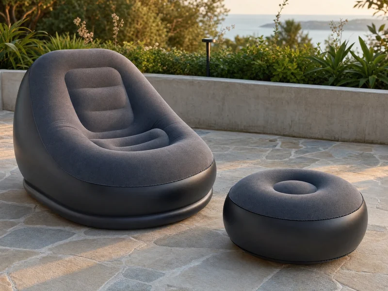 Inflatable lounge chair with footrest on a terrace